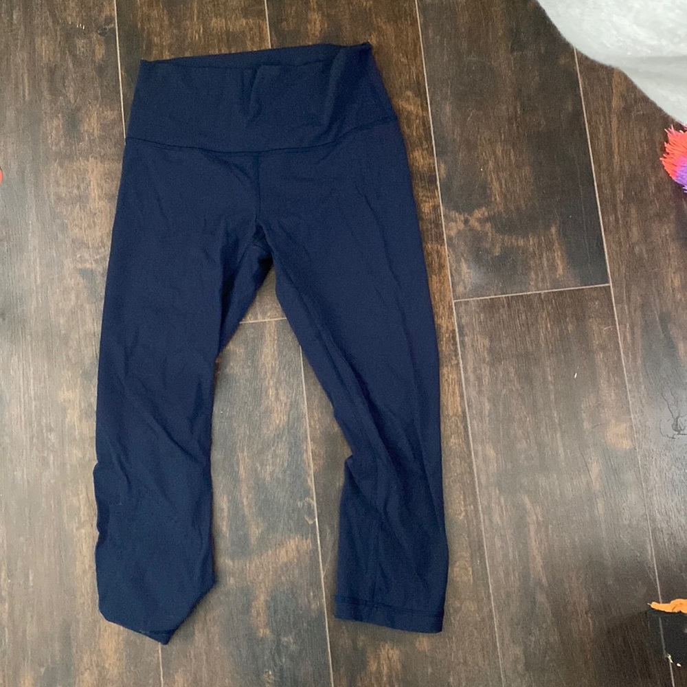 Size 4,hardly worn, lululemon leggings in dark blue